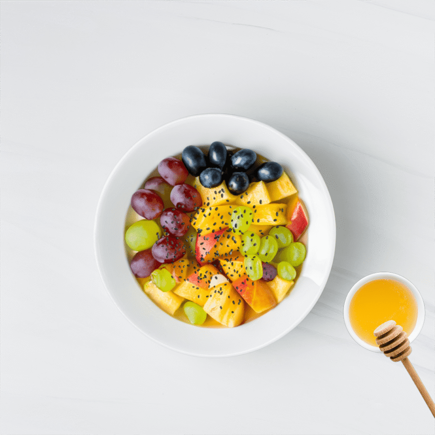 Fruit salad ( Apple + grapes + pineapple + chia seed + honey topping )