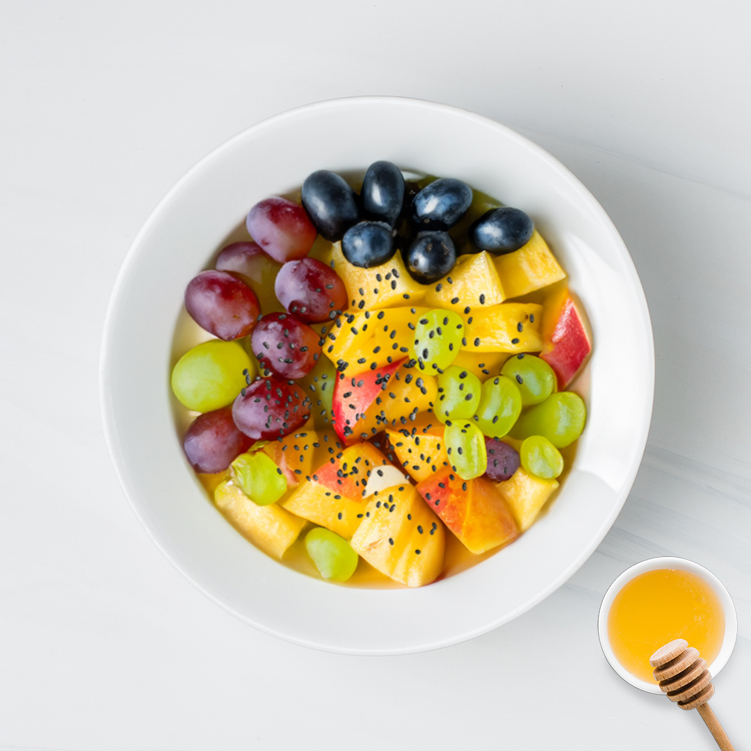 Fruit salad ( Apple + grapes + pineapple + chia seed + honey topping )